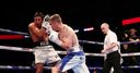 Johnson stuns Buglioni in opener