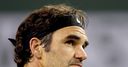 Rain suspends Federer match