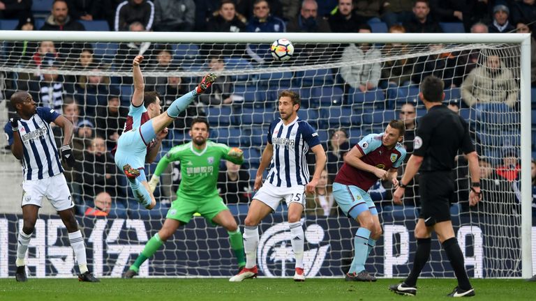 Barnes launches himself in the air to meet Lennon's cross to make it 1-0