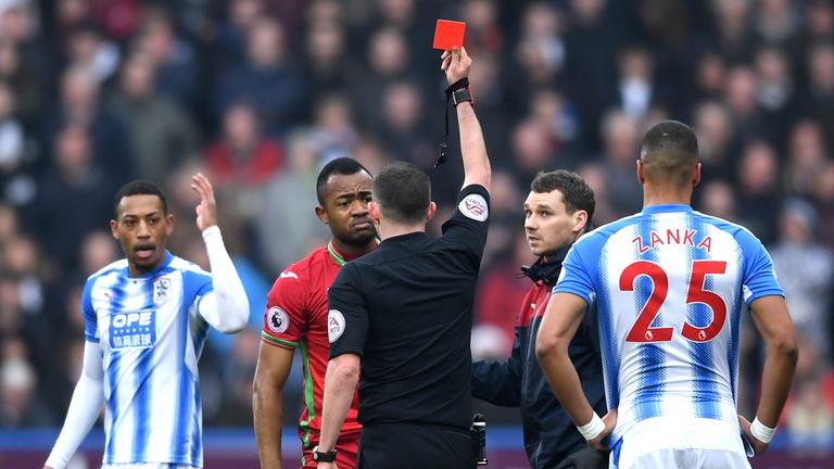 Jordan Ayew is shown a red card after just 11 minutes