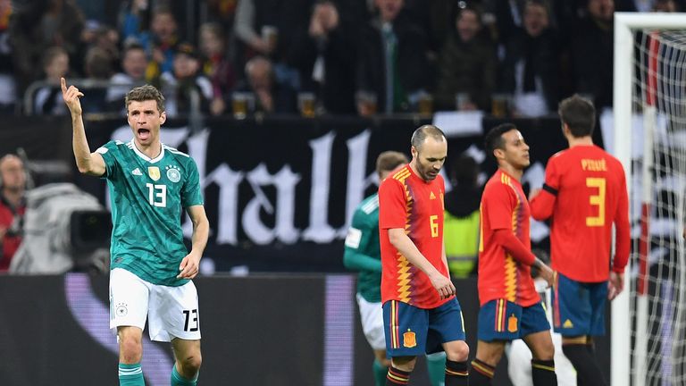 Thomas Muller wheels away in celebration after his stunning equaliser against Spain