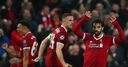 Salah stars but Roma stay in hunt