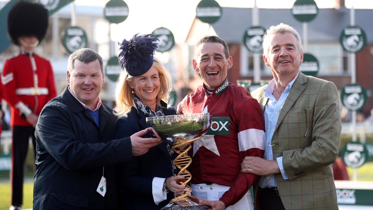Winning jockey Davy Russell, owner Michael O'Leary (right), trainer Gordon Elliott (left) and Anita O'Leary after winning the Grand National with Tiger Roll