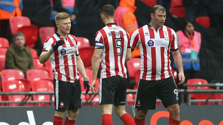 Lincoln City celebrate their opening goal in this year's final