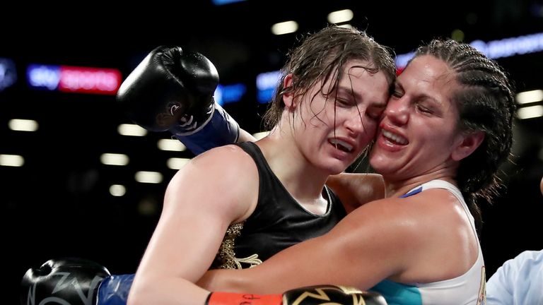 The two fighters embrace after a terrific contest