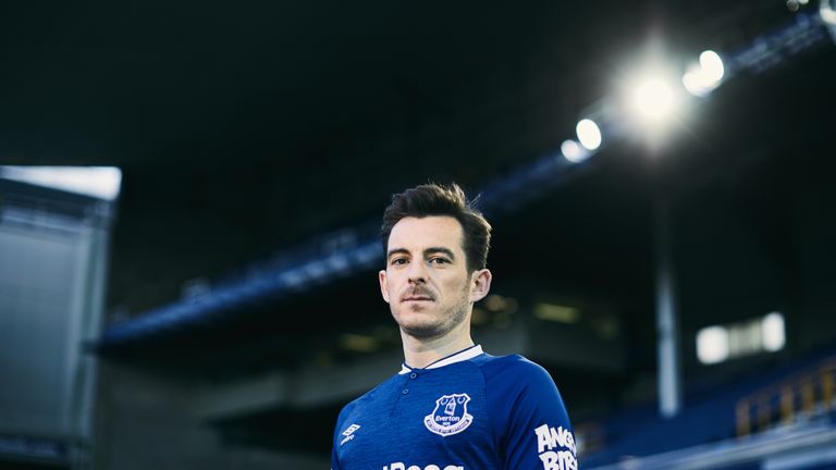 Leighton Baines models Everton's new home strip