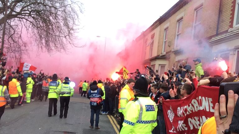    liverpool fans attack city bus
