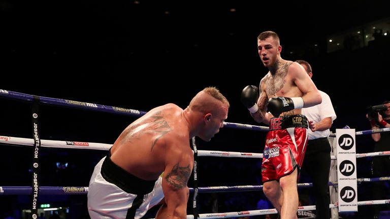 Eggington downs Szabo with a body shot