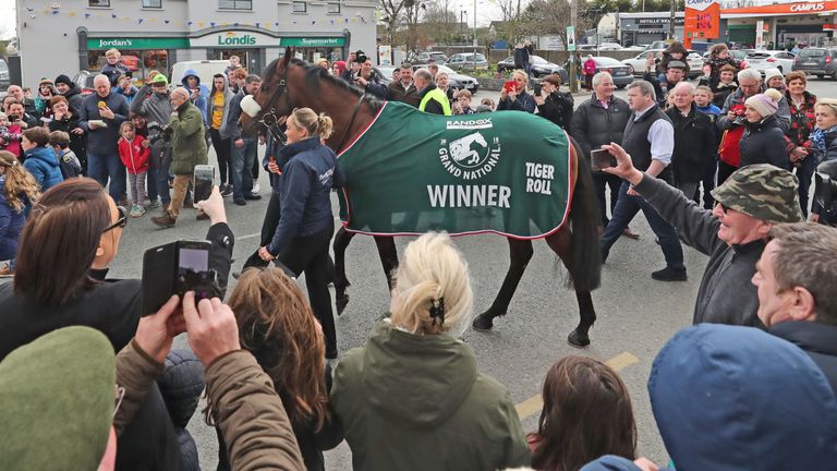 Trainer Gordon Elliot and Grand National winner Tiger Roll during the homecoming parade through Summerhill Village, County Meath
