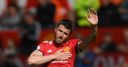 Carrick picks up coaching reins