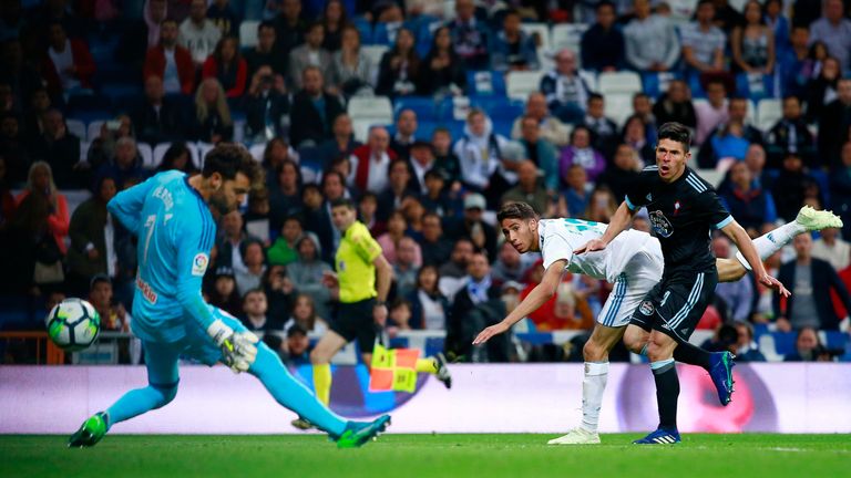 Achraf Hakimi gets his shot away to make it 4-0