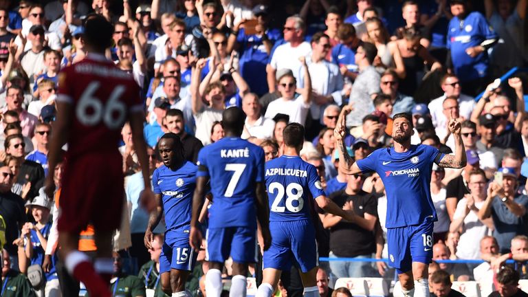 Olivier Giroud celebrates his winner against Liverpool with his Chelsea team-mates