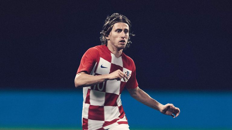 Luka Modric models the new Croatia home shirt - with a thicker checkerboard pattern