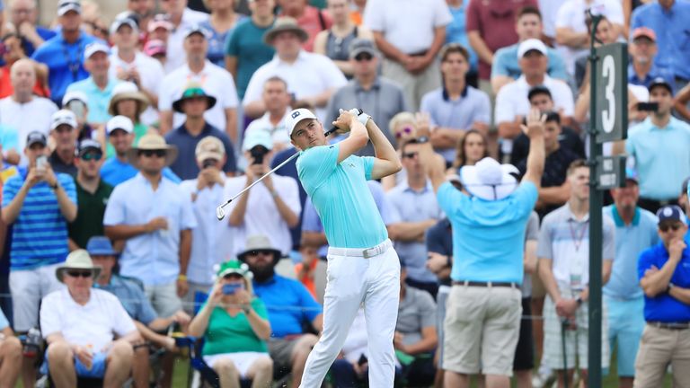 Jordan Spieth's 65 swept him into the top 10 early in day three