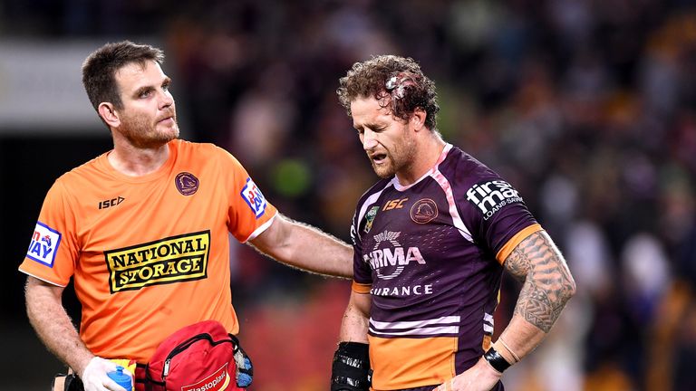 Sims is taken from the field with a cut in his head after being hit in a high tackle by Napa
