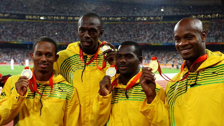 (L to R) Michael Frater, Usain Bolt, Nesta Carter and Asafa Powell celebrate their relay gold at the Beijing Olympics