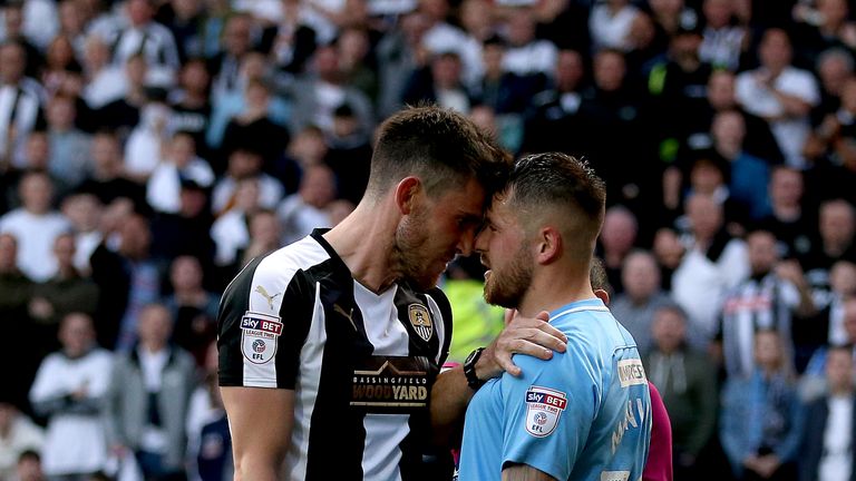 Notts County's Shaun Brisley (left) and Coventry's Marc McNulty go head to head