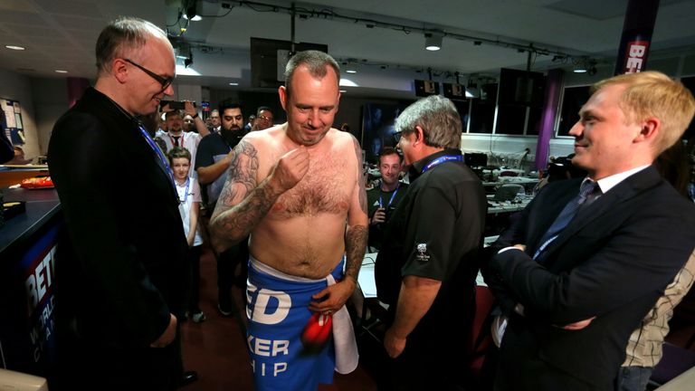 Williams wore only a towel into his press conference
