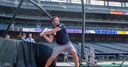 WATCH: Burgess gives baseball a go
