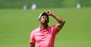 Woods falters late again