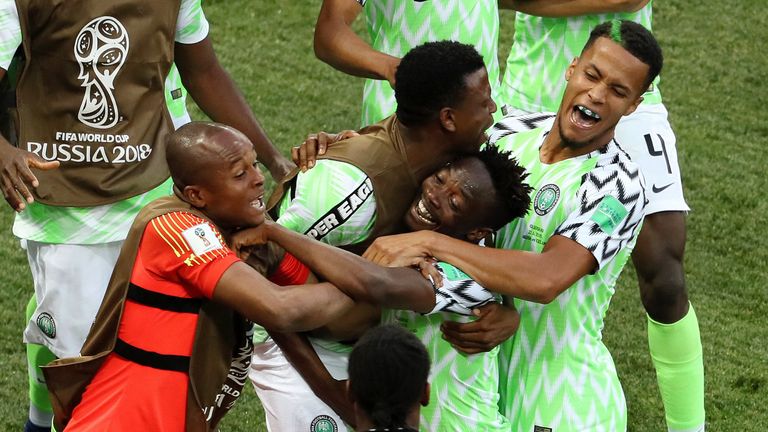 Musa celebrates his opener with team-mates