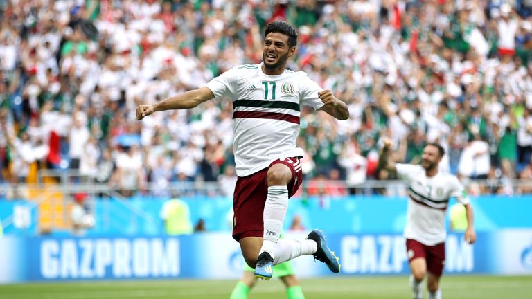 Carlos Vela celebrates after scoring a penalty for Mexico against South Korea