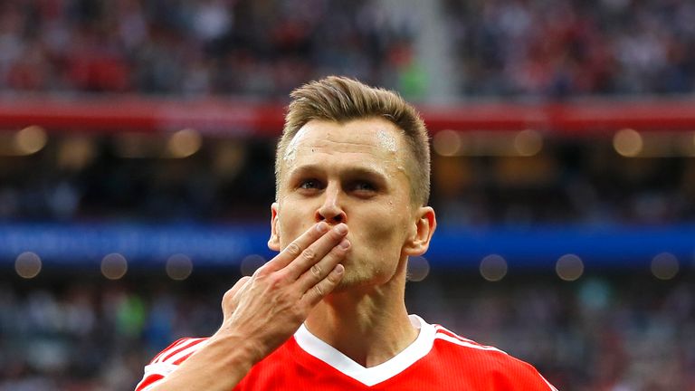 Denis Cheryshev celebrates scoring Russia's fourth in the 5-0 win over Saudi Arabia