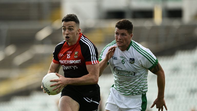 Evan Regan of Mayo in action against Iain Corbett of Limerick
