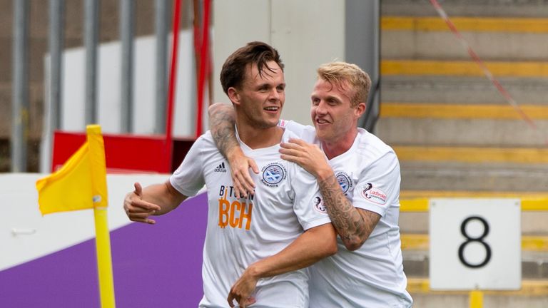 Ayr United's Lawrence Shankland (L) celebrates with Robbie Crawford