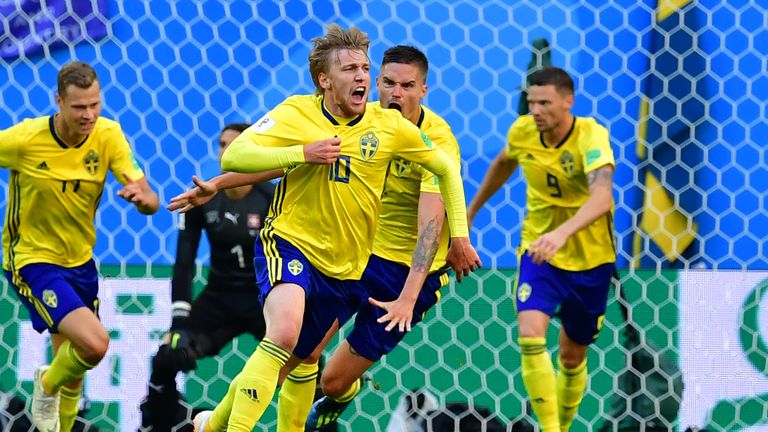 Emil Forsberg wheels away in celebration after giving Sweden the lead