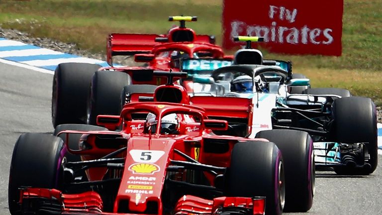 Hamilton leads Mercedes one-two at sodden Hungaroring