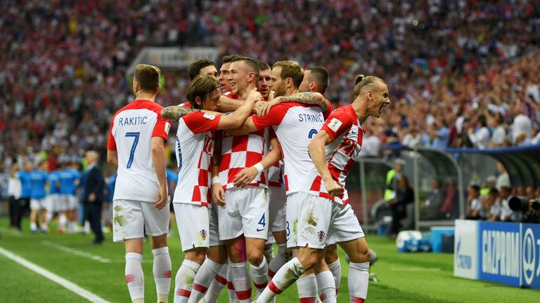 Ivan Perisic celebrates with team-mates after equalising for Croatia
