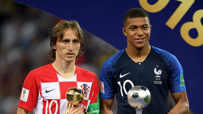 Luka Modric and Kylian Mbappe receive individual awards following the World Cup final