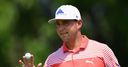 Woodland leads as storms hit PGA