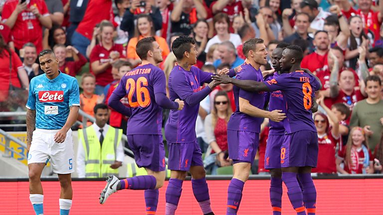 James Milner celebrates scoring against Napoli