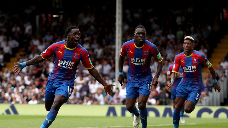 Jeffrey Schlupp wheels away after scoring the first goal of the game