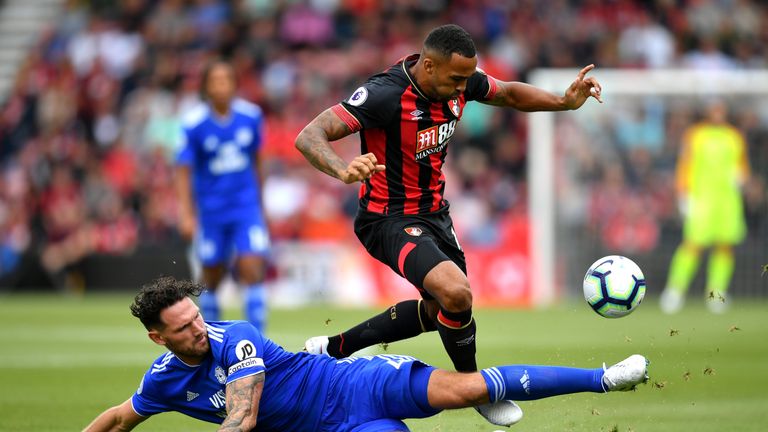 Sean Morrison tackles Callum Wilson (right)
