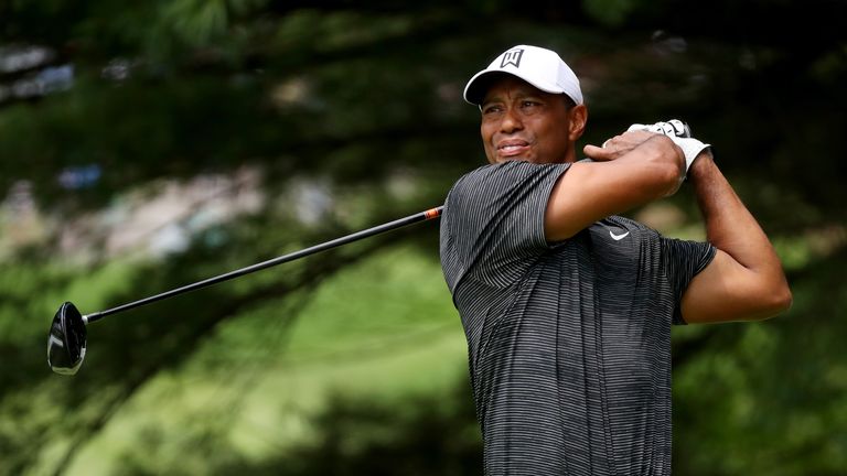 Woods goes into the weekend five off the pace