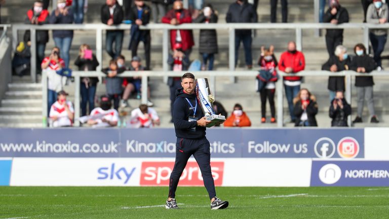 Super League: St Helens make it six straight wins with 28-0 victory over Salford Red Devils - St Helens' Tommy Makinson parades the Super League trophy to the supporters prior to kick-off