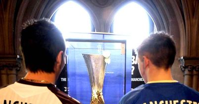 Rangers fans get close to the cup in Manchester