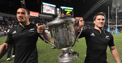 Cory Jane and Hosea Gear with the trophy