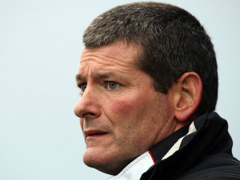 Image of Woods: Cards close to chest