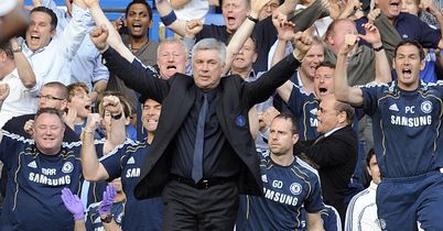 Late relief: Chelsea boss Carlo Ancelotti celebrates his side's winner against Tottenham to keep up the pressure on Manchester United at the top