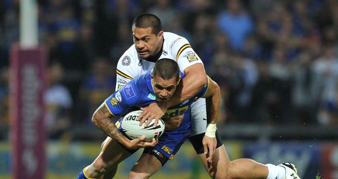 Tackled: Webb is wrapped up by Isa