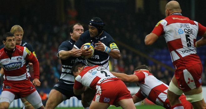 Sale&#39;s Sam Tuitupou tangles with the Gloucester defence