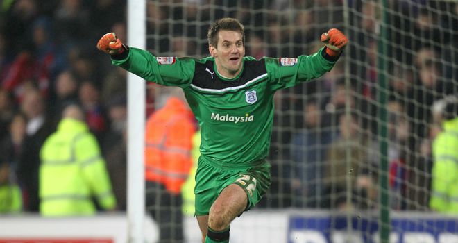 Tom Heaton: The Cardiff goalkeeper celebrates after seeing his side reach Wembley