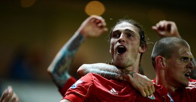 Andy Carroll was the hero for Liverpool as his late winner secured a 3-2 victory over Blackburn in the Barclays Premier League.