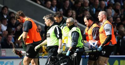 Tom Croft is carried off on a stretcher at the Twickenham Stoop