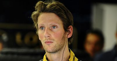 Lotus driver says sorry to Webber after their crash at Suzuka