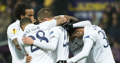 Gylfi Sigurdsson is mobbed by team-mates after scoring Tottenham's equaliser against Maribor in Group J.
